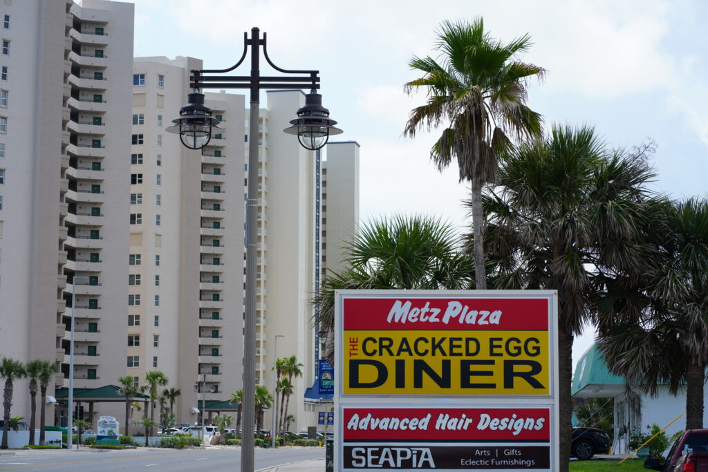 Metz Plaza street sign with The Cracked Egg Diner highlighted